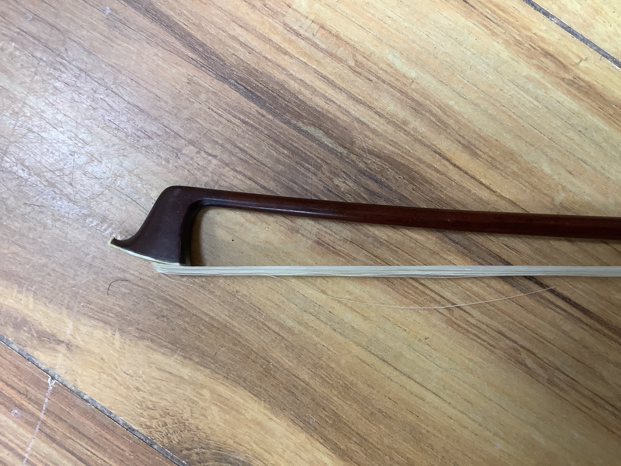 A cased violin and bow